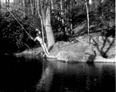 Dipping into Devil's Hole swimming hole